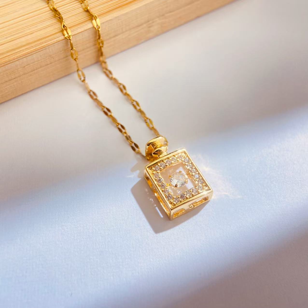Gold Perfume Bottle Necklace